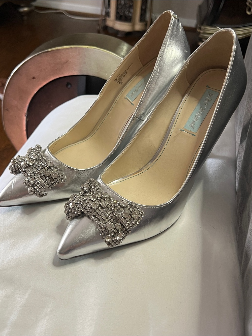 Betsey Johnson Silver Pointed-Toe Pumps with Crystal Embellished Bow
